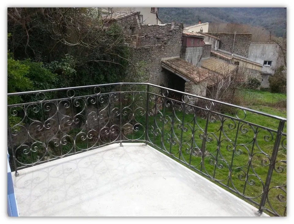 Garde-corps de terrasse à l'ancienne avec volutes